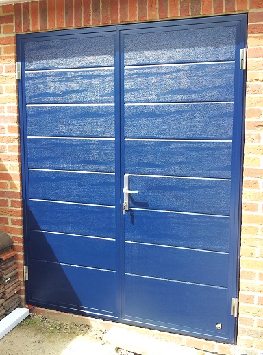 Picture of installed Ryterna side hinged garage doors      